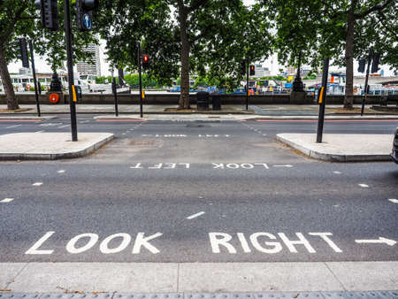 LONDON, UK - CIRCA JUNE 2017: look right and look left road signs (high dynamic range)のeditorial素材