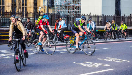 LONDON, UK - CIRCA JUNE 2017: Bicyclists in Parliament square, Westminster (high dynamic range)のeditorial素材