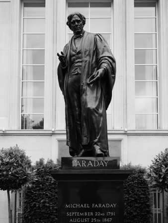 LONDON, UK - CIRCA JUNE 2017: Statue of Michael Faraday in Savoy Place in black and whiteのeditorial素材