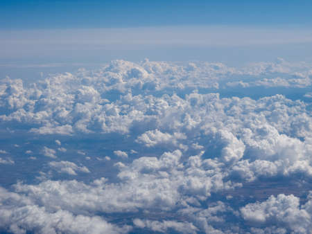 blue sky with clouds seen from a plane useful as a background