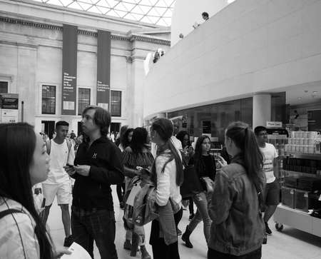 LONDON, UK - CIRCA JUNE 2017: Tourists visiting the British Museum in black and white