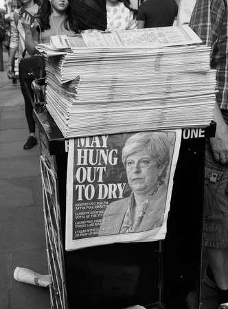 LONDON, UK - JUNE 09, 2017: Theresa May on the Evening Standard front page on the day after the general elections which resulted in a hung parliament in black and whiteのeditorial素材