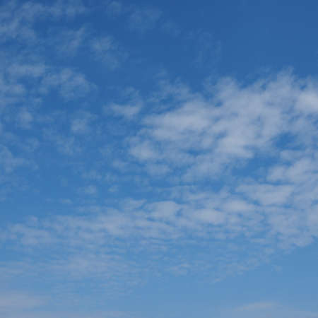 blue sky with clouds useful as a backgroundの写真素材