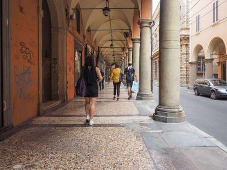 BOLOGNA, ITALY - CIRCA SEPTEMBER 2017: People in traditional colonnade porch (aka as portici)のeditorial素材