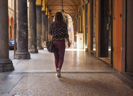 BOLOGNA, ITALY - CIRCA SEPTEMBER 2017: People in traditional colonnade porch (aka as portici)のeditorial素材