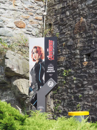 PONT SAINT MARTIN, ITALY - CIRCA AUGUST 2017: Signpost marking the film location of Avengers, Age of Ultron movie with Scarlett Johansson near the Point St Martin roman bridgeのeditorial素材