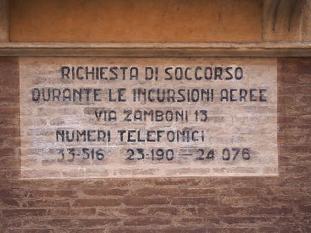 BOLOGNA, ITALY - CIRCA SEPTEMBER 2017: WW2 wartime sign, Richiesta di soccorso durante le incursioni aeree (meaning Rescue request during air raids)のeditorial素材