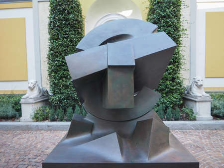 TURIN, ITALY - CIRCA AUGUST 2017: Stone sculpture entitled Sole Deposto (meaning Deposed Sun) by artist Gio Pomodoro outside Accorsi Ometto museumのeditorial素材