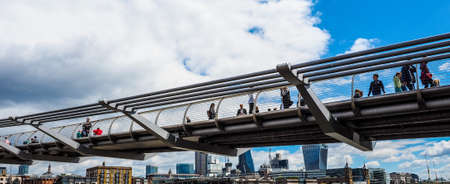 LONDON, UK - CIRCA JUNE 2017: Millennium Bridge over River Thames linking the City of London with the South Bank between St Paul Cathedral and Tate Modern art gallery (high dynamic range)のeditorial素材