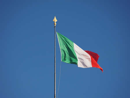 the Italian national flag of Italy, Europe over blue sky
