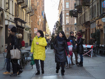 TURIN, ITALY - CIRCA JANUARY 2018: Tourists in Via Po colonnade porticoのeditorial素材
