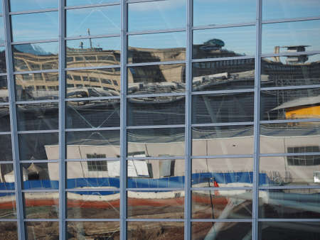 TURIN, ITALY - CIRCA JANUARY 2018: The Lingotto centre reflected on glassのeditorial素材