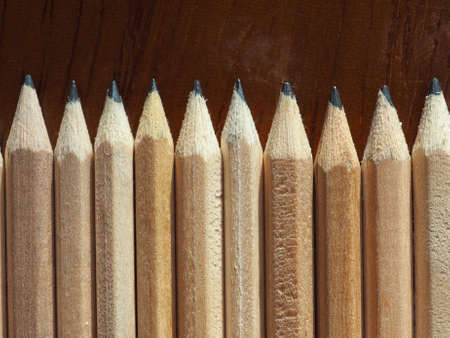 Many wooden pencils on a desk top