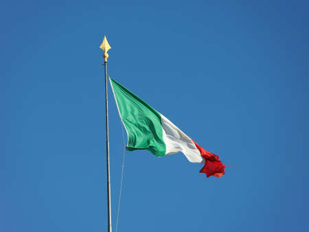 the Italian national flag of Italy, Europe over blue sky