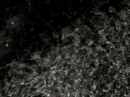 grunge dark black water texture useful as a backgroundの写真素材