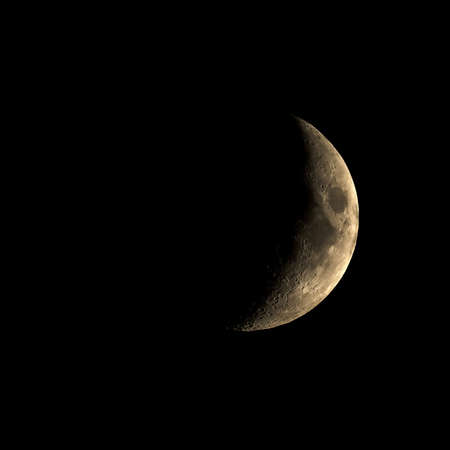 High contrast Waxing crescent moon seen with an astronomical telescope