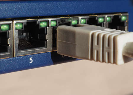 Modem router switch with ports for RJ45 plug in LAN local area network ethernet connectionの写真素材