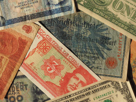 vintage withdrawn money of communist countries including Cuba, Soviet Union (SSSR), East Germany (DDR), and dollar notesの写真素材