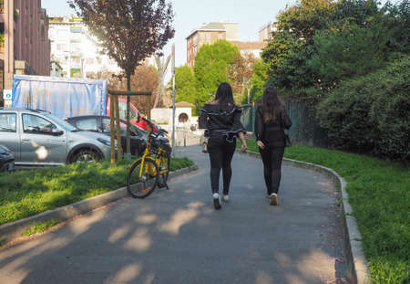 MILAN, ITALY - CIRCA APRIL 2018: People walking in the city centreのeditorial素材