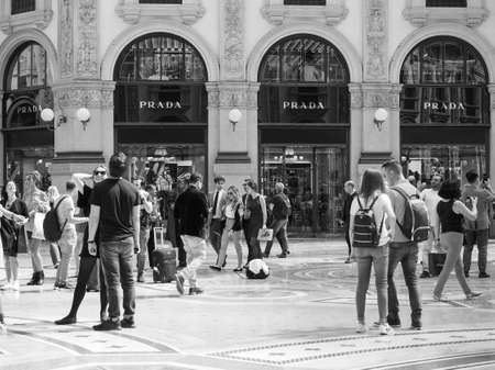 MILAN, ITALY - CIRCA APRIL 2018: People walking in the city centre in black and whiteのeditorial素材