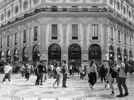 MILAN, ITALY - CIRCA APRIL 2018: People walking in the city centre in black and whiteのeditorial素材