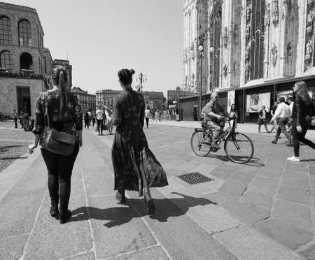 MILAN, ITALY - CIRCA APRIL 2018: People walking in the city centre in black and whiteのeditorial素材