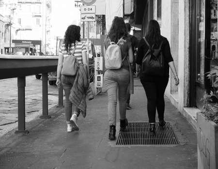 MILAN, ITALY - CIRCA APRIL 2018: People walking in the city centre in black and whiteのeditorial素材