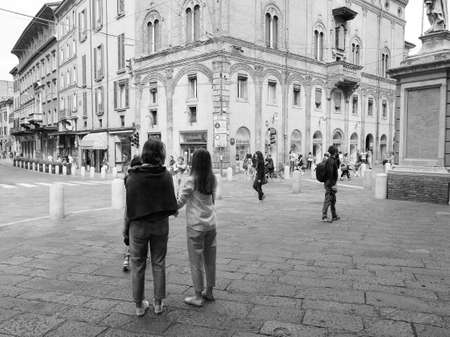 BOLOGNA, ITALY - CIRCA SEPTEMBER 2017: People in the city centre in black and white