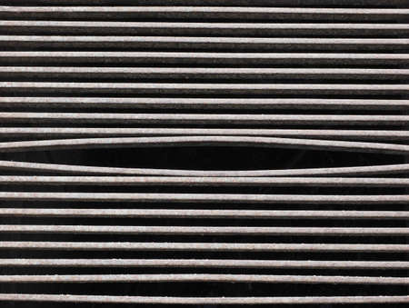 detail of a steel manhole grid in the streetの写真素材