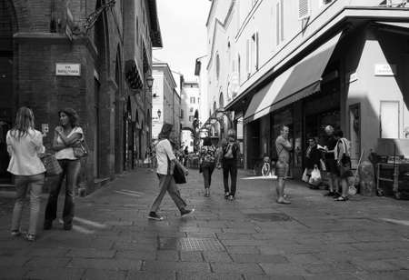 BOLOGNA, ITALY - CIRCA SEPTEMBER 2017: People in the city centre in black and whiteのeditorial素材