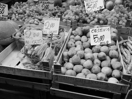 BOLOGNA, ITALY - CIRCA SEPTEMBER 2017: vegetables and fruits at a market in the city centre in black and whiteのeditorial素材