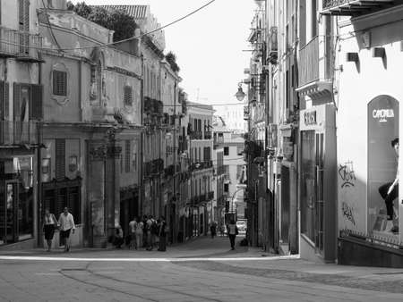 CAGLIARI, ITALY - CIRCA SEPTEMBER 2017: People in Castello quarter aka Casteddu e susu (meaning Upper Castle in Sard) old medieval town city centre in black and whiteのeditorial素材