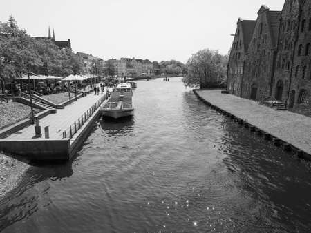LUEBECK, GERMANY - CIRCA MAY 2017: An der Obertrave street in black and white