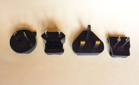 LONDON, UK - CIRCA MAY 2018: Australian (type I), European (type C), British (type G) and American (type A) electrical plugsのeditorial素材