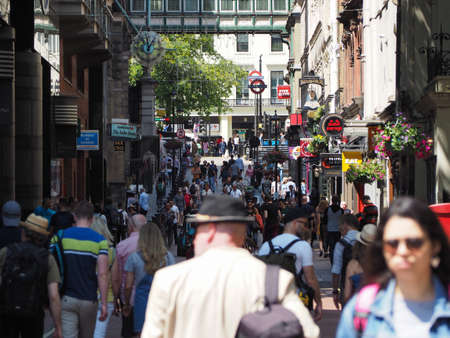 LONDON, UK - CIRCA JUNE 2018: People in Villiers Street connecting the Strand with the Embankment