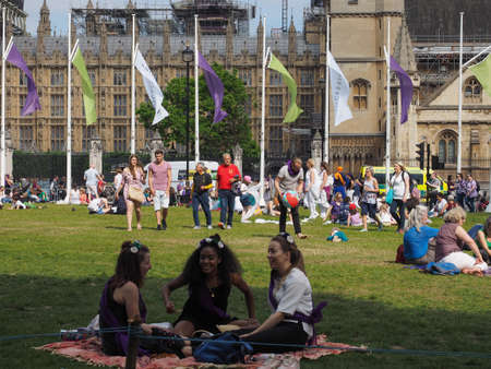 LONDON, UK - CIRCA JUNE 2018: Women suffrage at 100. Women march across London to the Parliament Square to celebrate the centenary of female voting.のeditorial素材