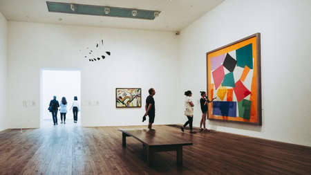 LONDON, UK - CIRCA JUNE 2018: Visitors at Tate Modern art gallery in South Bank power stationのeditorial素材