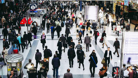 LONDON, UK - CIRCA 2015: Travellers at Liverpool Street Station