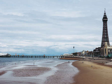 BLACKPOOL, UK - CIRCA JUNE 2016: Blackpool Pleasure Beach resort and Blackpool Tower on the Fylde coast in Lancashireのeditorial素材