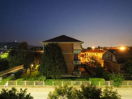 Starry night in summer. City skyline view.