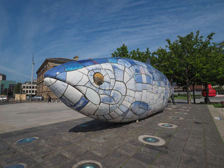 BELFAST, UK - CIRCA JUNE 2018: The Big Fish (akaThe Salmon of Knowledge) ceramic mosaic sculpture by John Kindness in Donegall Quayのeditorial素材