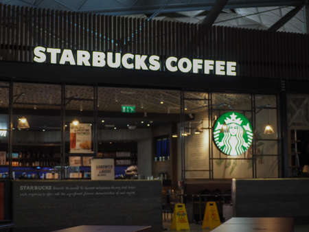 LONDON, UK - CIRCA JUNE 2018: Starbucks coffee shop at Stansted Airportのeditorial素材