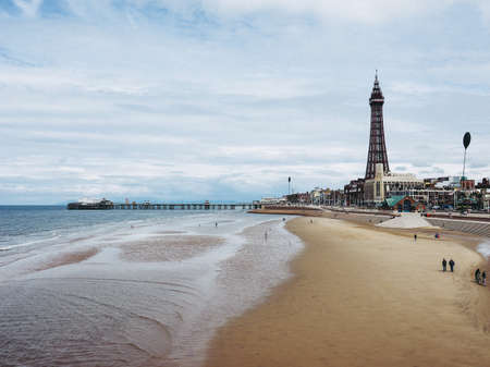 BLACKPOOL, UK - CIRCA JUNE 2016: Blackpool Pleasure Beach resort and Blackpool Tower on the Fylde coast in Lancashireのeditorial素材