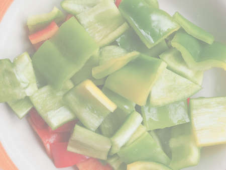 Green peppers (Capsicum) aka bell peppers vegetables vegetarian and vegan food, delicate soft faded tone useful as backgroundの写真素材