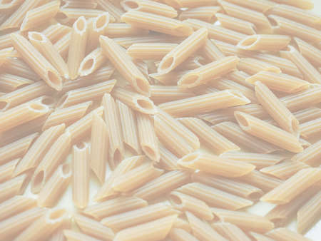 Penne pasta, delicate soft faded tone useful as background
