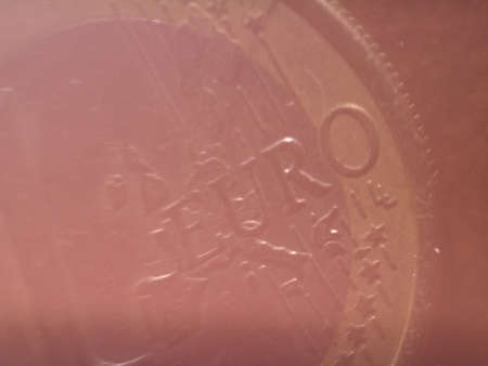 one euro coin money (EUR), currency of European Union, vintage light leak effectのeditorial素材