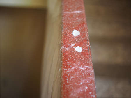 Paper masking tape (painter's tape) and nylon cover used in painting to mask off areas that should...