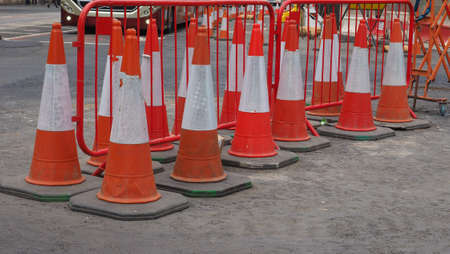 traffic cone to mark road works or temporary obstruction traffic signのeditorial素材