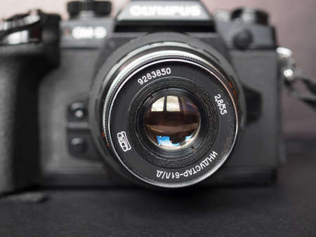 MOSCOW, RUSSIA - CIRCA SEPTEMBER 2018: Vintage Sovietic lens mounted on modern Olympus digital camera. The text in Russian means Industar 61 L-Dのeditorial素材