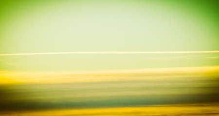 blue sky with plane vapour trails (aka contrails, short for condensation trails) vintage retro